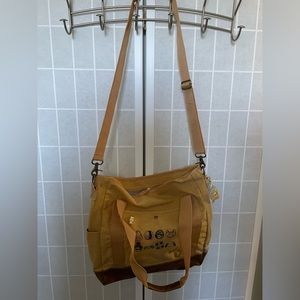 AS Classic Canvas Messenger Bag with animal graphic design.